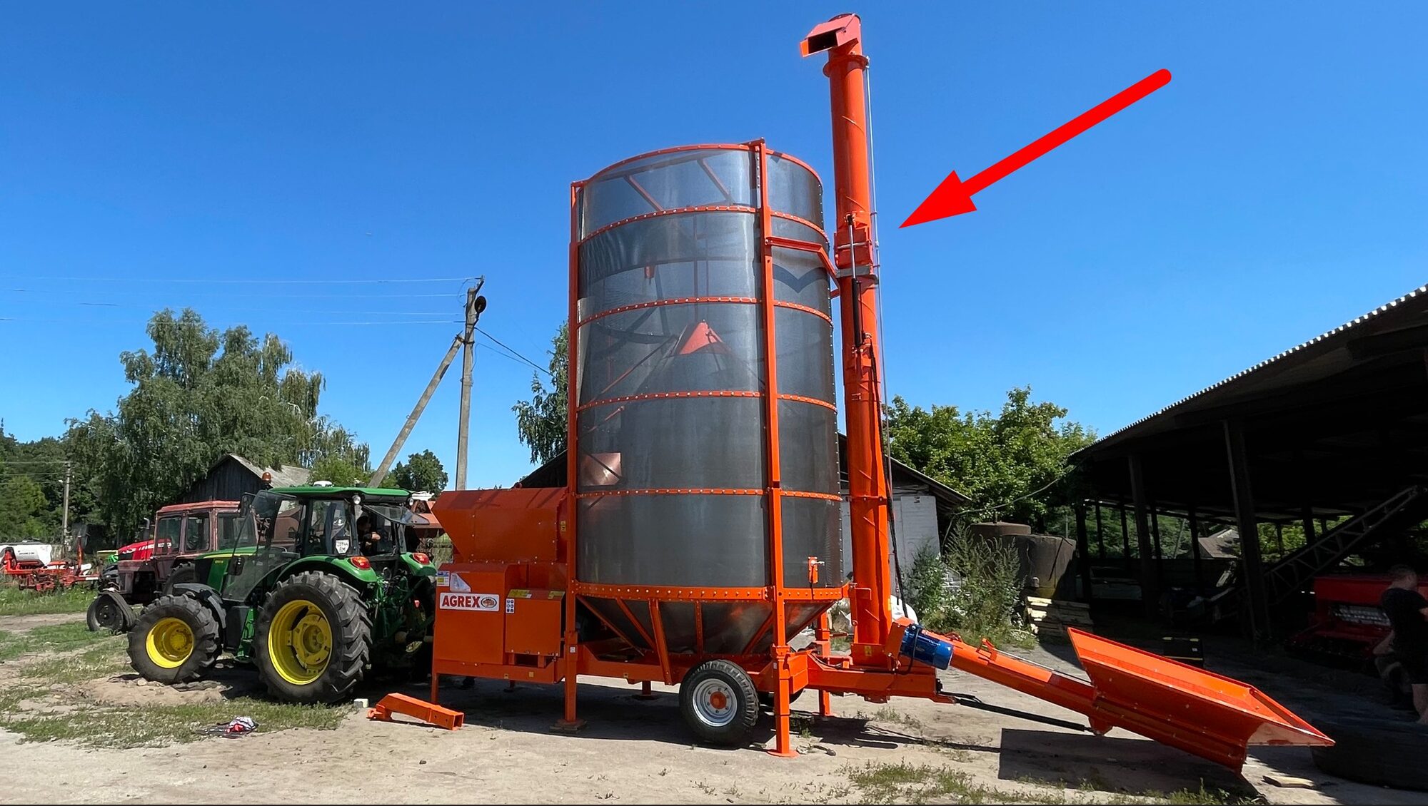 External grain recirculation auger of an Agrex grain dryer