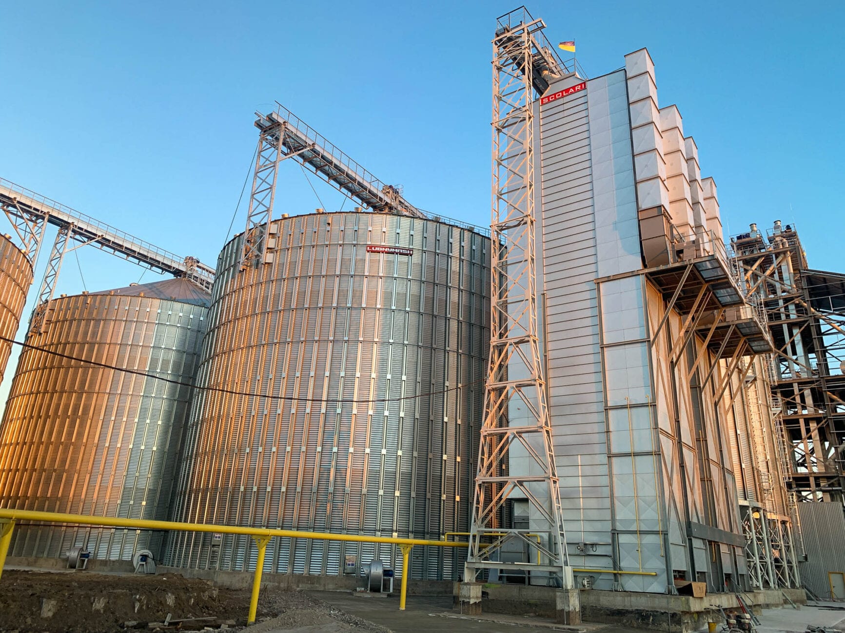 Two-zone tower grain dryer for corn