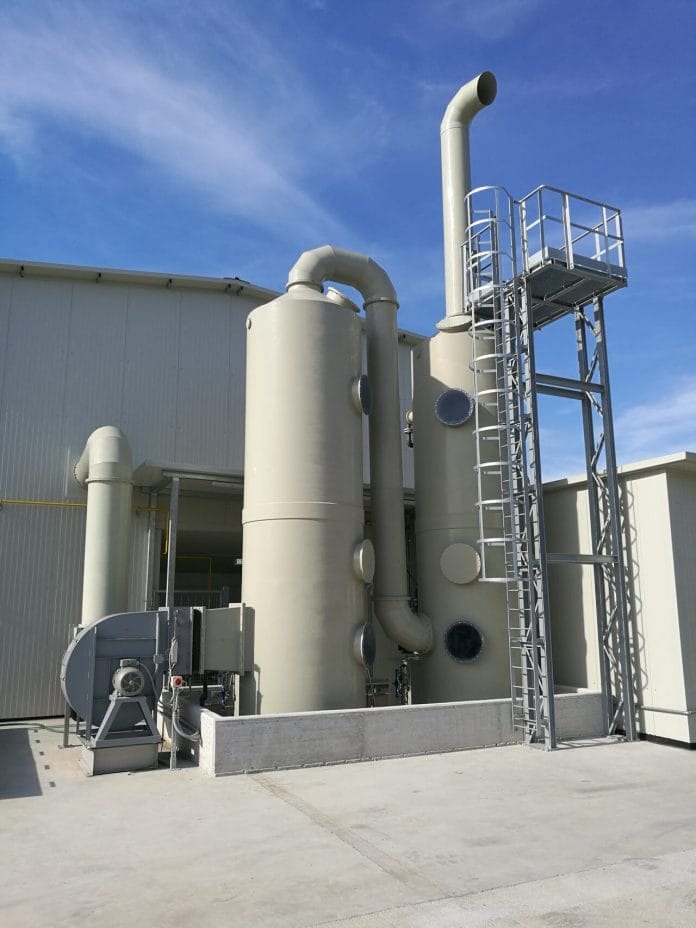 Scrubber for conveyor dryer
